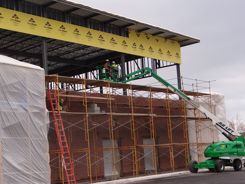 construction workers on the second floor of the Naval Federal Credit Union
