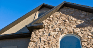 Stucco home with stone veneer facade