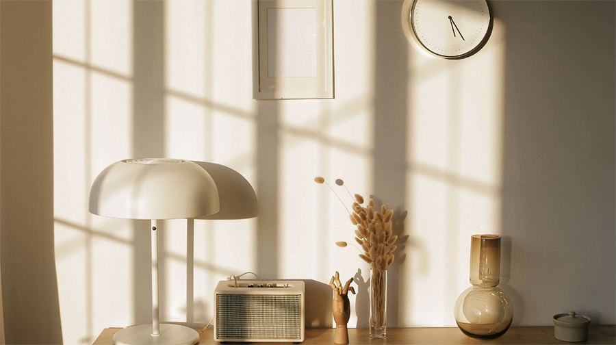 tan home interior with table and lamp