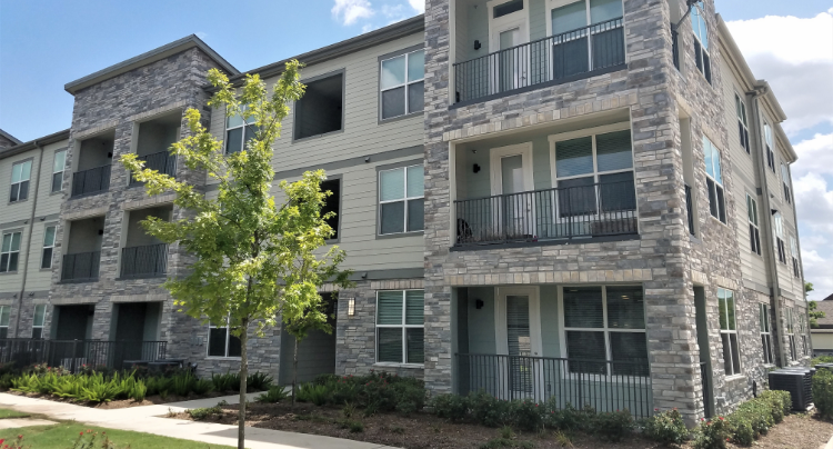 condo building with stone veneer